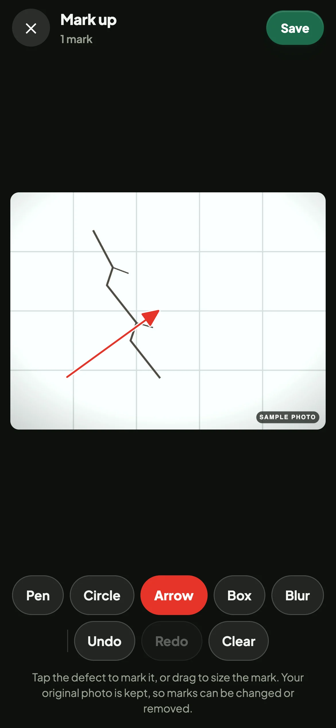 A red arrow pointing at the crack