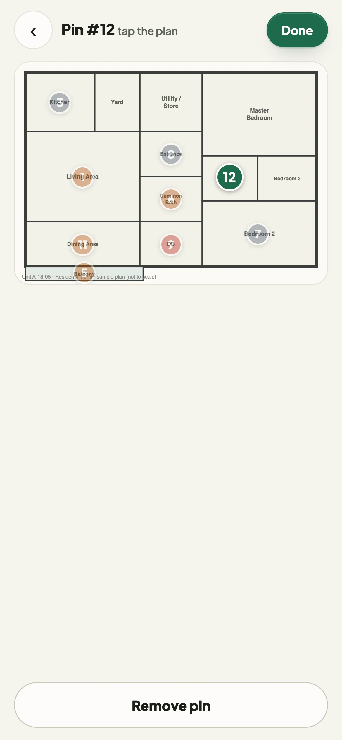 The floor plan of the unit with pin 12 placed in the master bathroom and earlier pins shown faintly